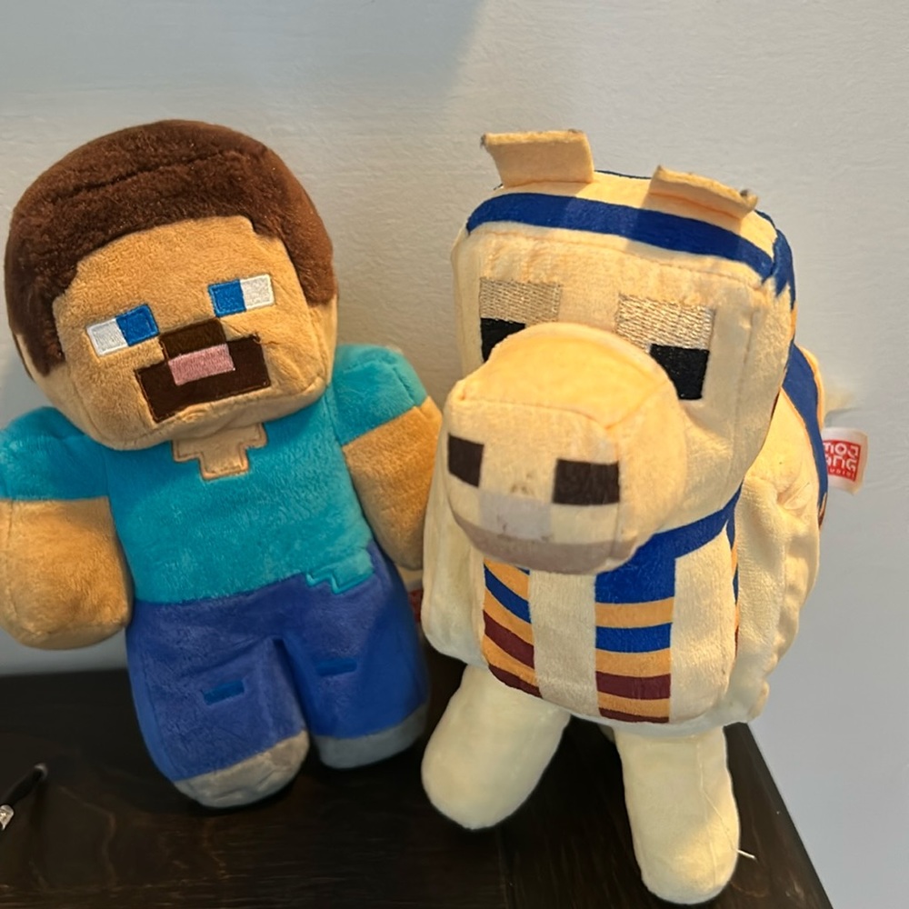 Used plushies (Steve and a lama) from Minecraft